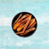 Classic Sweet Potato Fries · Golden fried to a crisp and seasoned lightly dipped in olive oil and sauce.