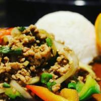 Pad Kra Pow · Green bean, bell pepper, yellow onion, garlic, mushroom, and basil with a choice of ground c...