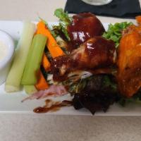 Sweet Baby Ray’s Buffalo Wings, BBQ or Chef Eric’s extra Spicy Wings · served with carrot sticks and celery, green onion and creamy ranch dipping sauce