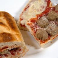 Meatball Sandwich · flavorful meatballs with pizza sauce and mozzarella cheese on toasted bread SERVED WITH FRIES