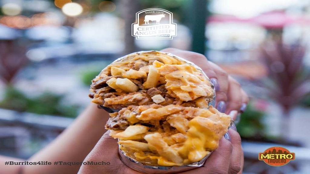 Haystack · Choice of meat, choice of beans, rice, cheese, sour cream, salsa nacho cheese and French fries.