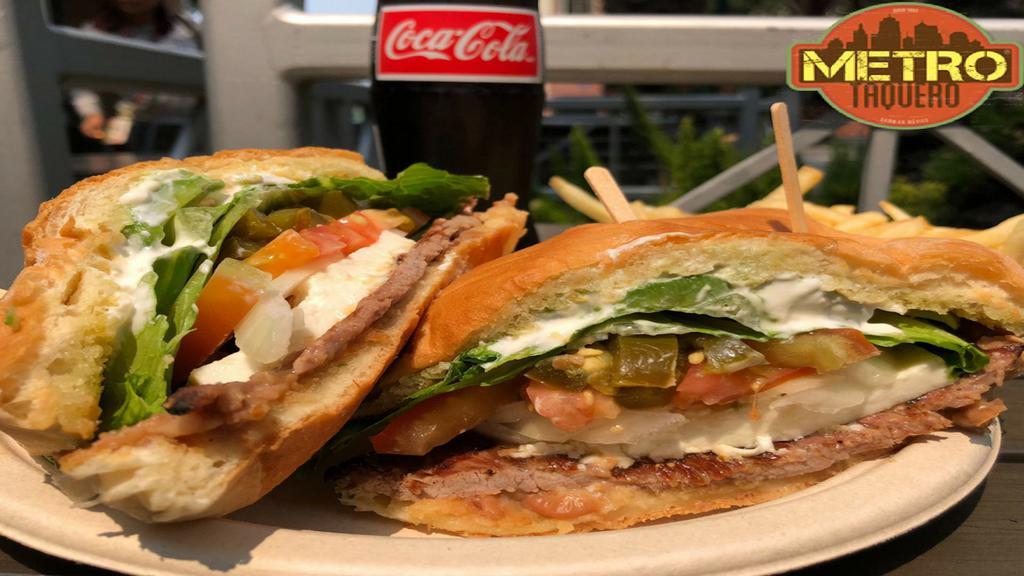 Torta Suprema · Choice of meat, refried beans, lettuce, tomato, onion, avocado slices, queso fresco and sour cream on a telera roll. Served with french fries.