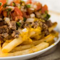 Steak Fries · Choice or meat, fries, melted nacho cheese, pico de gallo and sour cream.