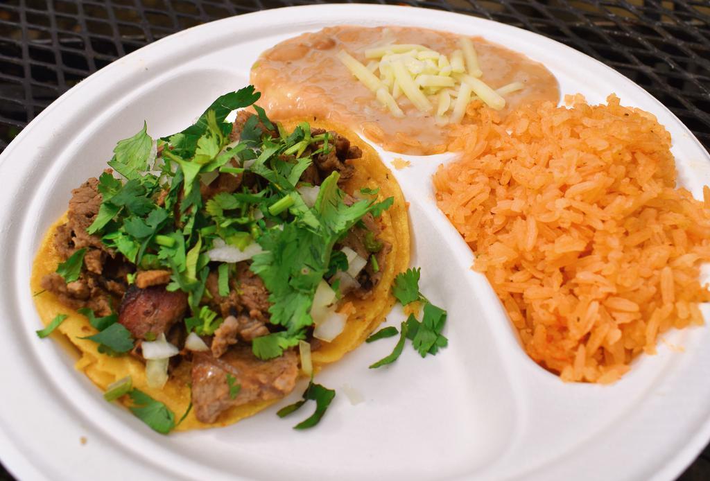 1 Taco · Served with rice and beans.