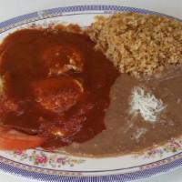 Huevos Rancheros · 2 eggs with our special red sauce includes rice and beans .