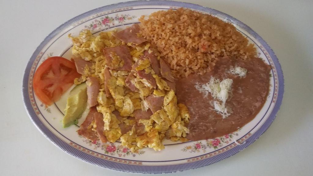 Ham and Eggs / Huevos con Jamon · 3 scrambled eggs & ham . Includes rice and beans and tortillas.