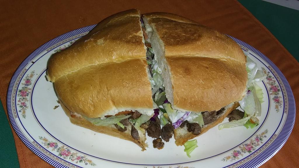  Torta · 1 piece. Your choice of meat . Sour cream, avocado, tomatoes , lettuce, onions , cilantro and salsa.