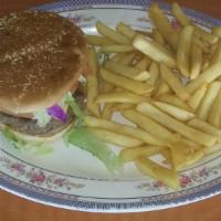 Hamburger · Beef patty with cheese , tomato lettuce and mayonnaise served with french fries.