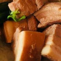 Braised Pork Belly (Kakuni) · Sweet soy braised pork belly 5 pcs, 1/2 soft boiled egg, and green onion.