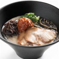 Karaka Spicy Ramen · The original tonkotsu pork broth with an added kick, thin noodles toped with our special ble...