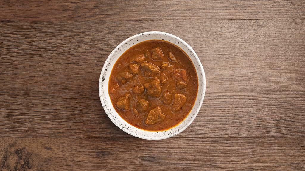 Lamb Curry · Lamb cooked with herbs and spices in a curry sauce.