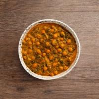 Chana Saag · Garbanzo beans and spinach cooked in light spices.