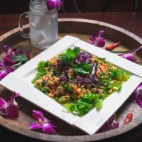 Laap Gai · Minced chicken tossed with mint, rice powder, carrot, scallion, and cilantro