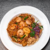 Shrimp Pad Thai · Pan-fried rice noodle with tofu, egg, scallion, bean sprouts, and shrimps with ground peanut...
