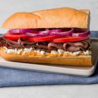 Chipotle Blue Roast Beef · London broil roast beef, blue cheese, tomatoes, red onion, chipotle gourmaise on French roll.