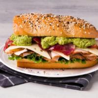 Turkey Club · Boar's Head Ovengold® Turkey, Bacon, Avocado, Havarti, Lettuce, Tomato & Ranch Dressing on e...