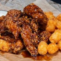 Tender Combo · 3 Big-Ass crispy tenders with 1 flavor, 1 side and 1 dipping sauce

Flavor served on the sid...