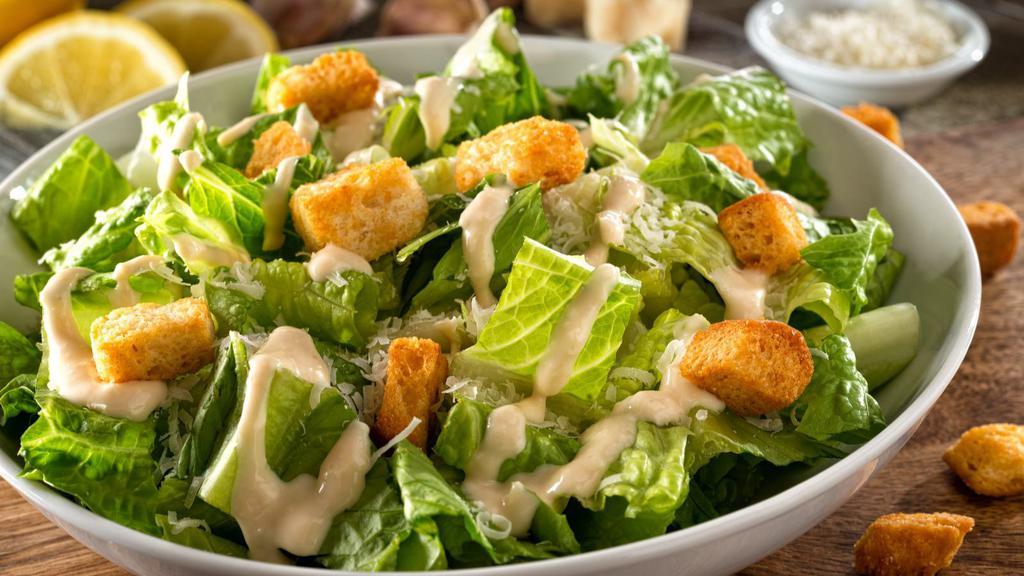Caesar Salad · Fresh lettuce, red onions, bell peppers, tomatoes all seasoned with caesar dressing and virgin oil.
