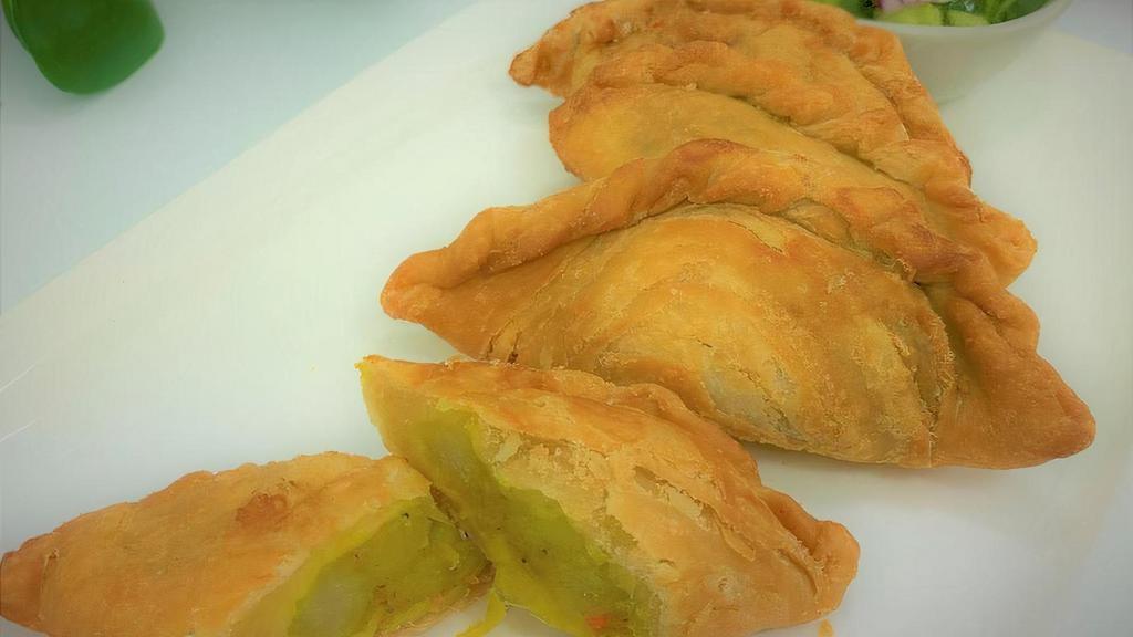 Thai Samosa · Pastry filled with potato, carrot, onion and touch of curry