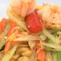 Som Tum · Shredded green papaya with shrimps, tomato, chilies, green beans, peanuts tossed with lime b...