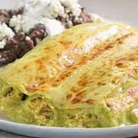 8. Enchiladas Suizas · 3 enchiladas Slow roasted green sauce chicken enchiladas served with rice and Beans.