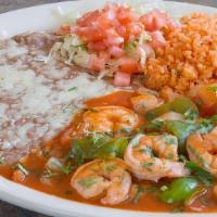 4. Shrimp Ranchero · Cooked with onions,tomatoes,bell pepper served with rice and beans and tortilla.
