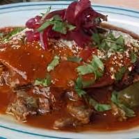 3. Steak Ranchero · Cooked with onions,tomatoes,bell pepper served with rice and beans and tortilla.