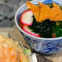 Udon · Udon noodles in dashi broth with vegetables, crab cake and choice of chicken or tempura