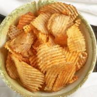 *Peri Potato Chips · Vegetarian. Delicious potato chips smothered with peri salt.