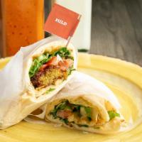 Falafel Pita · Falafel patties in a toasted pita with lettuce, tomato & garlic sauce.