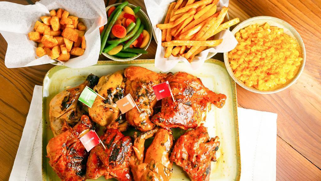 Party Platter · Great for 4-6 people. Includes two whole chickens (8 pieces) with your choice of four large sides.