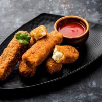 Paneer Pakora · Traditionally prepared battered cottage cheese snack, dipped in flour batter, mixed Indian s...