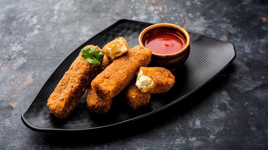 Paneer Pakora · Traditionally prepared battered cottage cheese snack, dipped in flour batter, mixed Indian spices and deep-fried to perfection.