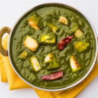 Palak Paneer · Spinach cooked with homemade cheese.