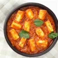 Butter Paneer · Fresh cottage cheese, mouthwatering Indian spices, and homemade tomato sauce cooked with a h...