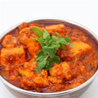 Paneer Kadai · Paneer cooked with chopped bell peppers, diced tomatoes, onions and our chef's special homem...