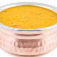 Daal Tadka · Split yellow lentils, fresh curry leaf and Indian spices cooked with a hint of butter. Serve...