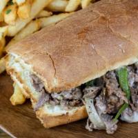 Philly Cheese Steak · Your choice of chicken or shredded beef, mushrooms, green peppers and onions topped with mel...