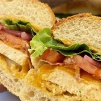 Chicken Sandwich · Chicken breast, bacon, lettuce, tomatoes, pickled red onions, cheddar cheese, sriracha Mayo ...