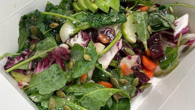 Detox Salad · Kale, carrots, beets, pumpkin seeds, avocado, cucumber, ginger vinaigrette dressing.