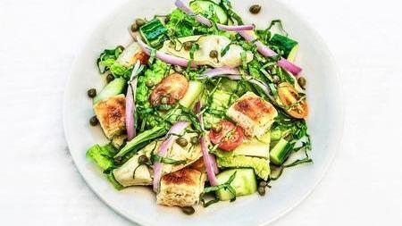 ARTICHOKE PANZANELLA SALAD · classic Tuscan bread salad with artichoke hearts, cucumbers, cherry tomatoes, red onion, romaine, basil, capers served with our red wine vinaigrette