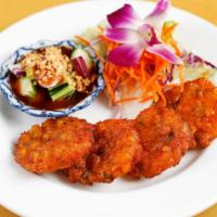 Spicy Corn Cakes (Vegetarian) · Recommended! Corn and green beans mixed with a very mild curry sauce, then fried and served ...