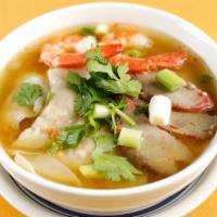 Wonton Noodle Soup · Pork and Prawns (non-vegetarian dish) with bean sprouts, green onions and cilantro.