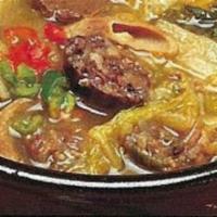 8. U Guh Ji Soon Dae Guk Bab · Korean style sausage soup with Napa.