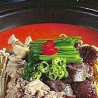 12. Nae Jang Sool Guk · Spicy intestine soup with vegetables.