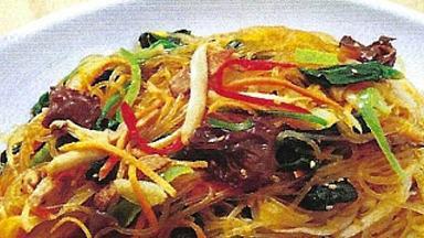 22. Jab Chae · Pan-fried clear noodles with beef and vegetables.