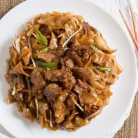 Mongolian Beef · Beef stir-fried w/ onion, scallions in Mong sauce. Served w/ fried rice noodles. Hot & spicy.