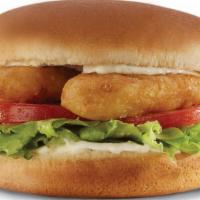 Fish Sandwich · Four ounces of cod stacked on tarter sauce, lettuce, and tomato.