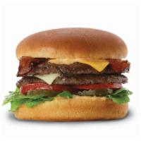 The Double Decker™ · Two of our quarter lb. patties stacked with sauce, pickle. Lettuce, tomato, Swiss and Americ...