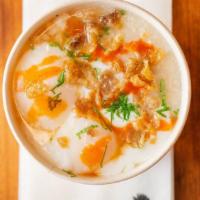 Delivery Bowl Khao Tom Gai 12oz · Organic chicken simmered in rich ginger broth, thickened with rice , crispy chicken skins, p...